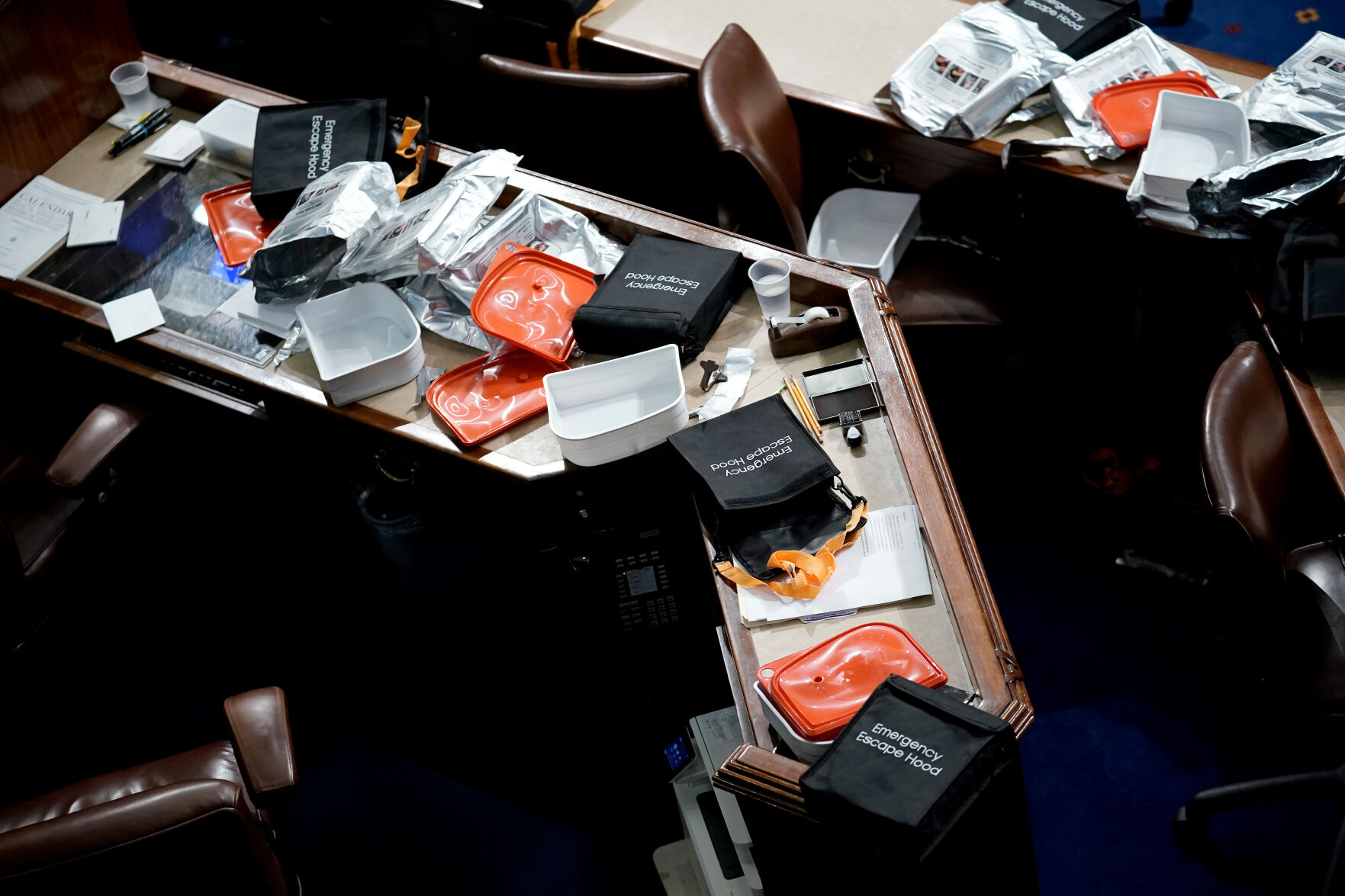 Papers and other equipment are left on desks
